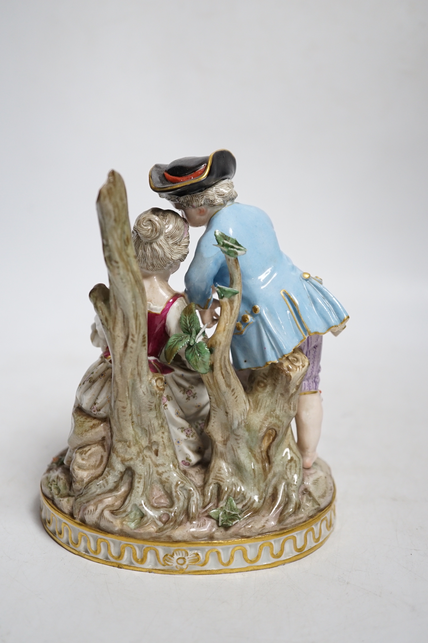 A Meissen group of a boy and a girl with a piccolo, 19th century